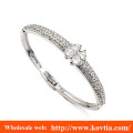 Women elegant white gold and white diamond inaly bangle